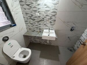Bathroom in 2.5 BHK Apartment at Nivasa Enchante, Lohgaon – for Rent