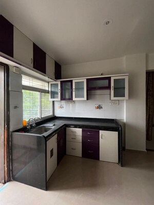 Kitchen in 1 BHK Apartment at Siddhivinayak Karuna, Viman Nagar – for Sale