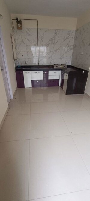 Kitchen in 2 BHK Apartment at Tulip Infinity Planet, Moshi – for Rent