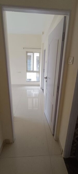 Building Lobby in 2 BHK Apartment at Tulip Infinity Planet, Moshi – for Rent