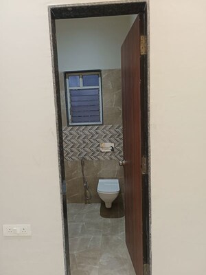 Bathroom in 2 BHK Apartment at Ishwar Parmar River Residency, Chikhali – for Rent