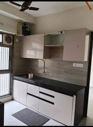 Kitchen in 1 BHK Apartment at Onkar CHS, Goregaon East – for Rent