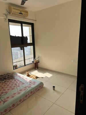 Bedroom in 2 BHK Apartment at Chandak 34 Park Estate, Goregaon West – for Rent