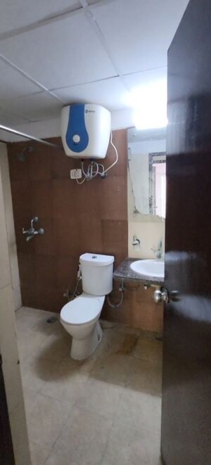 Bathroom in 3 BHK Apartment at Mahagun Moderne, Sector 78 – for Rent