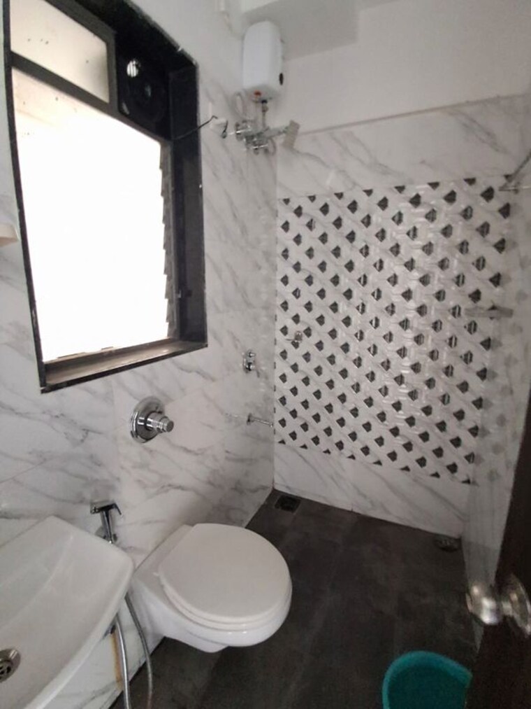 Bathroom, uk-iridium 2 Bedroom 586 Sq.Ft. Apartment In Kandivali East Mumbai 10608345