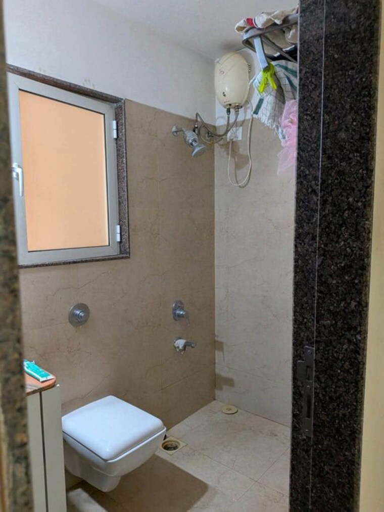 Bathroom, puranik-rumah-bali 1 Bedroom 600 Sq.Ft. Apartment In Ghodbunder Road Thane 10608393