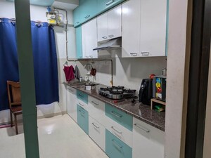 Kitchen in 1 BHK Apartment at Puranik Rumah Bali, Ghodbunder Road – for Rent
