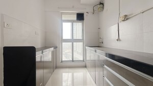 Kitchen in 1.5 BHK Apartment at Godrej Emerald, Ghodbunder Road – for Rent