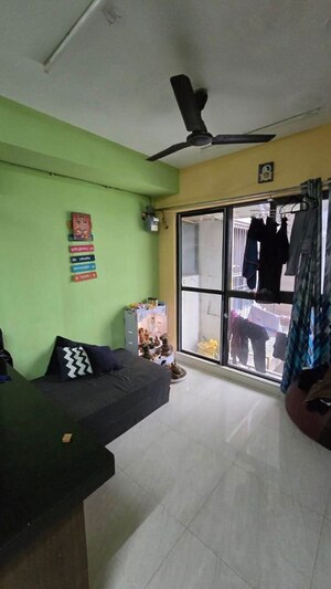 Living Room in 1 BHK Apartment at Lodha Crown Quality Homes, Majiwada – for Rent