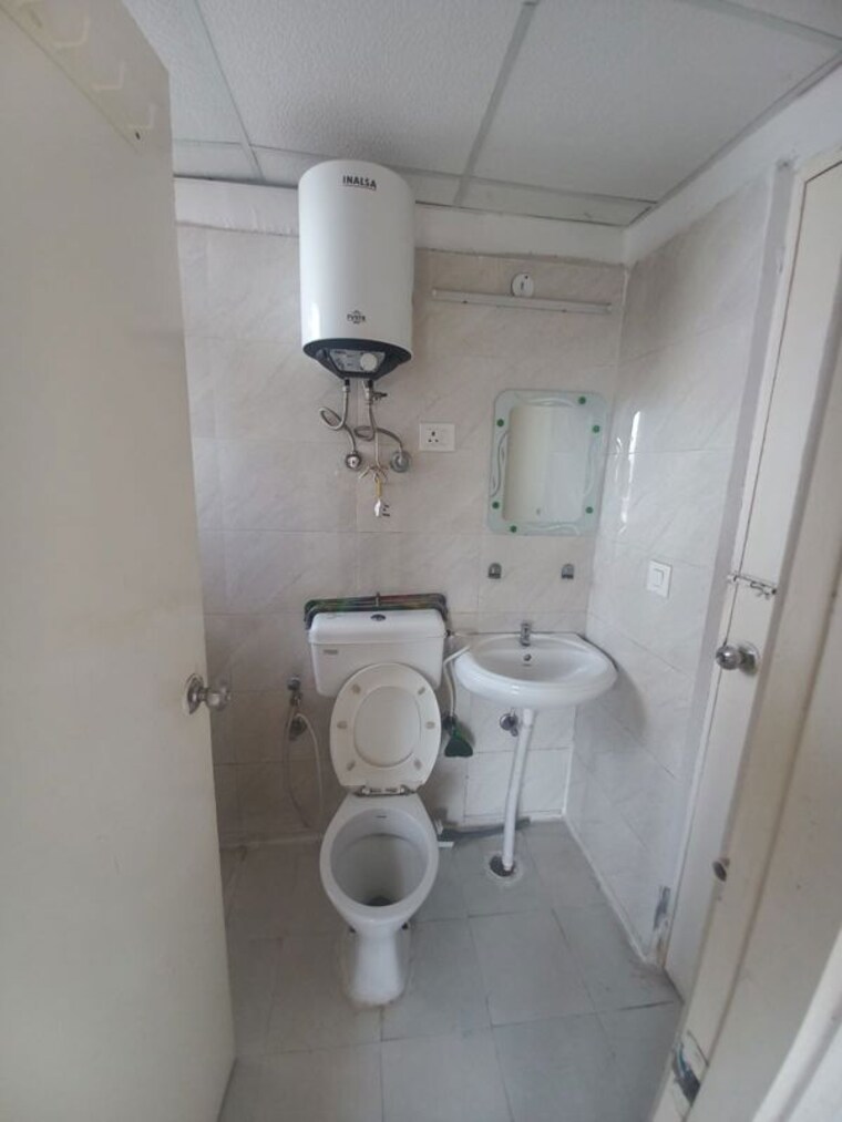 Bathroom, signature-global-the-millennia 2 Bedroom 690 Sq.Ft. Apartment In Sector 37d Gurgaon 10608417