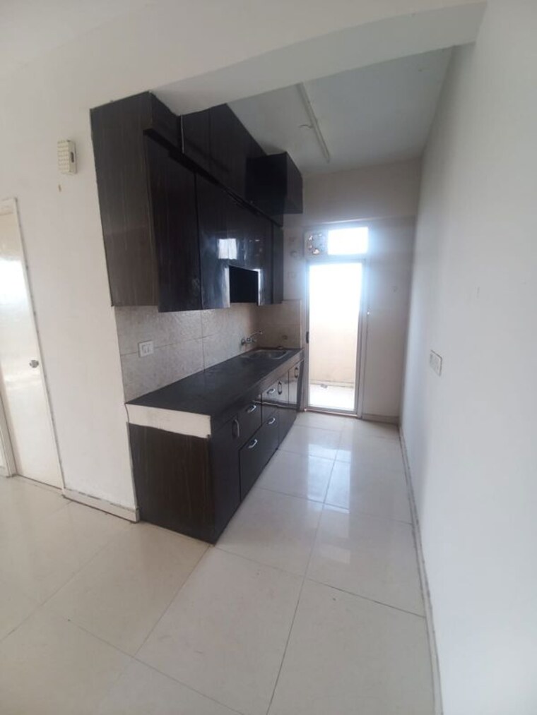 Kitchen, signature-global-the-millennia 2 Bedroom 690 Sq.Ft. Apartment In Sector 37d Gurgaon 10608417