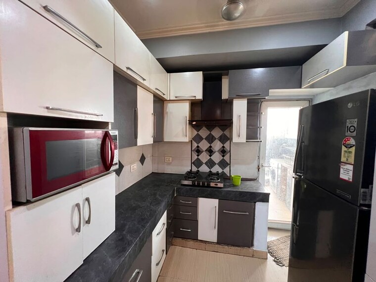 Kitchen, paramount-floraville 2.5 Bedroom 1110 Sq.Ft. Apartment In Sector 137 Noida 10608425