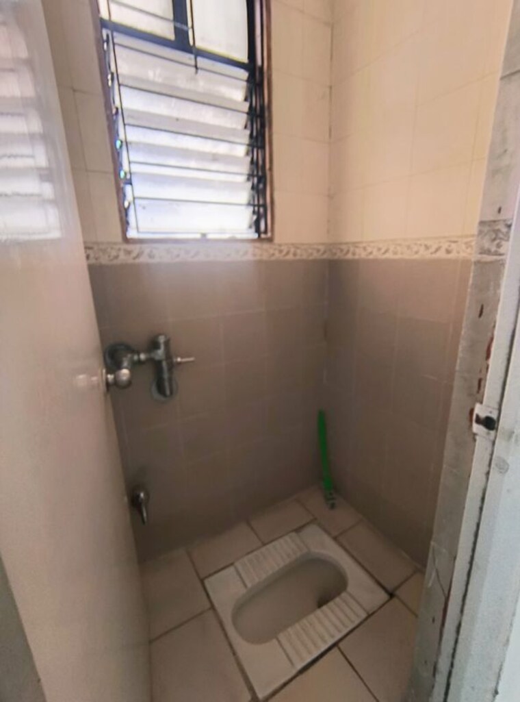 Bathroom, magarpatta-city-heliconia 1 Bedroom 500 Sq.Ft. Apartment In Hadapsar Pune 10608404