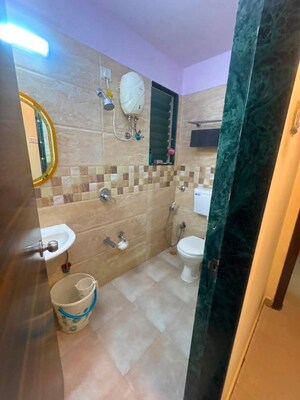 Bathroom in 2 BHK Apartment at Mahavir Kalpavruksha, Ghodbunder Road – for Sale