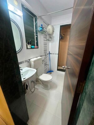 Bathroom in 2 BHK Apartment at Mahavir Kalpavruksha, Ghodbunder Road – for Sale