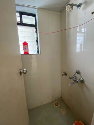 Bathroom in 1 BHK Apartment at Lodha Golden Dream, Dombivli East – for Rent