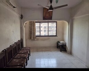 Living Room in 1 RK Apartment at The Shiv Ganga CHS, Dahisar East – for Rent