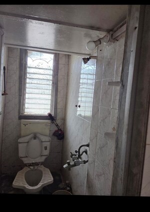 Bathroom in 1 RK Apartment at The Shiv Ganga CHS, Dahisar East – for Rent