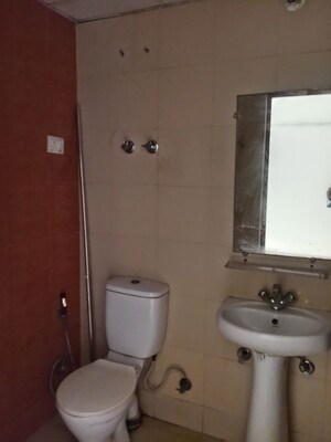 Bathroom in 4 BHK Apartment at Mahagun My Woods, Sector 16c Greater Noida – for Rent