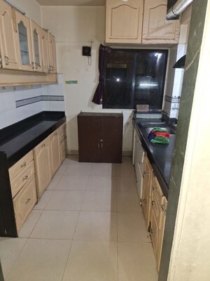 Kitchen in 3 BHK Apartment at Flower Valley Apartment, Wanowrie – for Rent