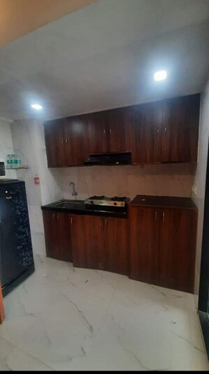 Kitchen in Studio Apartment at Royal Palms, Goregaon East – for Rent