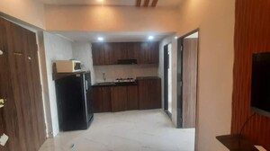 Living Room in Studio Apartment at Royal Palms, Goregaon East – for Rent