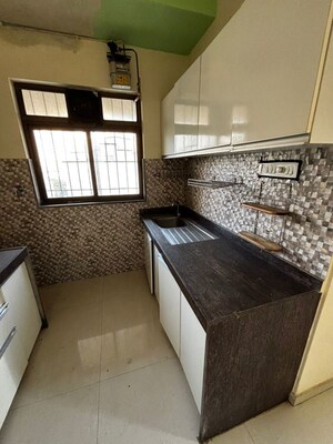 Kitchen in 2 BHK Apartment at Lalani Grandeur, Goregaon East – for Rent