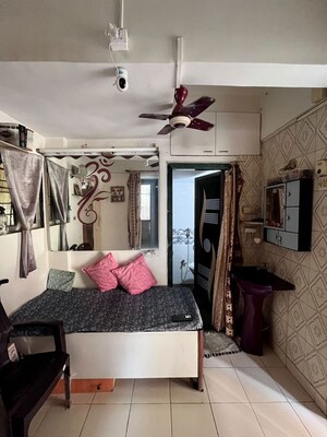 Living Room in 1 BHK Apartment at Brahmand – for Sale