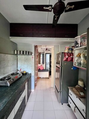 Kitchen in 1 BHK Apartment at Brahmand – for Sale