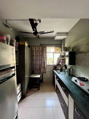 Kitchen in 1 BHK Apartment at Brahmand – for Sale