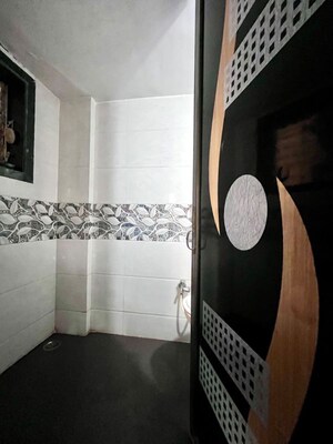 Bathroom in 1 BHK Apartment at Brahmand – for Sale