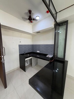 Kitchen in 1 BHK Apartment at Lodha Crown Quality Homes, Majiwada – for Sale