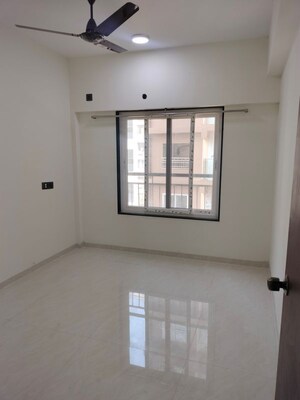 Room in 2 BHK Apartment at Omkar Ananta, Goregaon East – for Rent