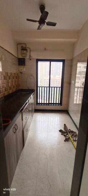 Kitchen in 1.5 BHK Apartment at Atul Blue Fortune, Andheri East – for Rent