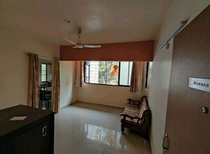 Living Room in 1 BHK Apartment at Bhusari Colony – for Sale