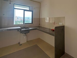 Kitchen in 2 BHK Apartment at Piramal Vaikunth, Balkum Pada – for Rent