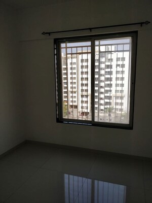 Room in 2 BHK Apartment at Mulik Luxuria, Wagholi – for Rent