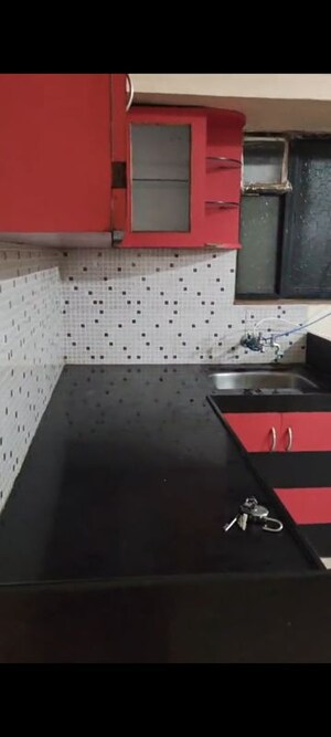 Kitchen in 2 BHK Apartment at Pimple Gurav – for Rent