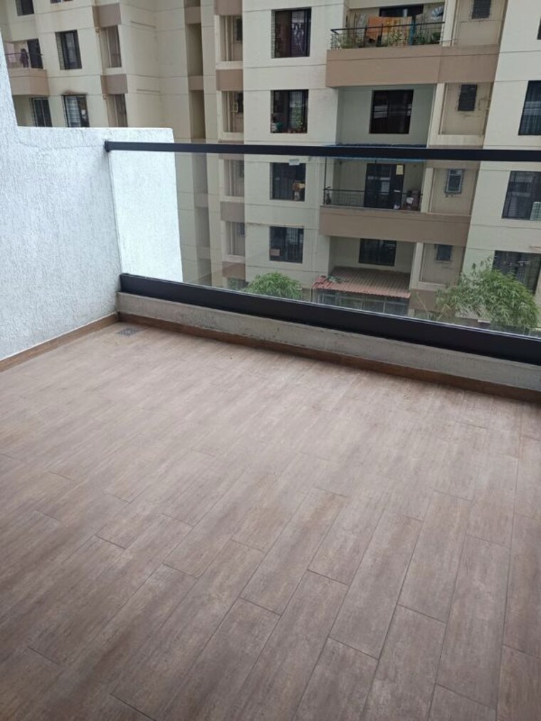 Balcony, majestique-signature-towers 2 Bedroom 850 Sq.Ft. Apartment In Balewadi Pune 10609387