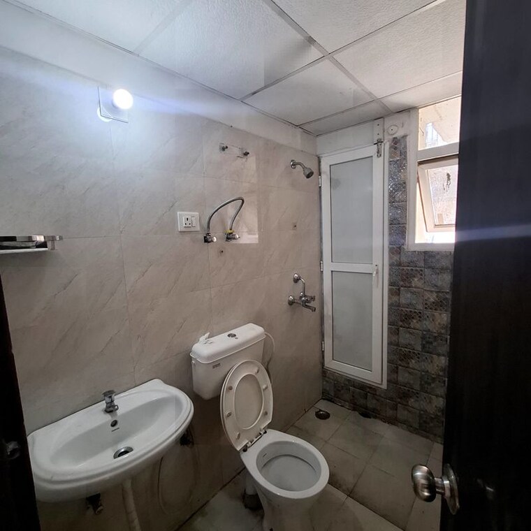 Bathroom, signature-global-the-millennia 2 Bedroom 800 Sq.Ft. Apartment In Sector 37d Gurgaon 10609466
