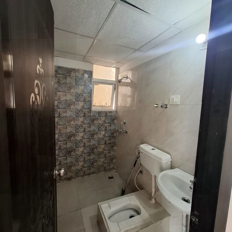 Bathroom, signature-global-the-millennia 2 Bedroom 800 Sq.Ft. Apartment In Sector 37d Gurgaon 10609466