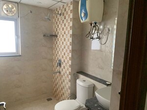 Bathroom in 3 BHK Apartment at Manglam Rangoli Greens, Vaishali Nagar – for Rent