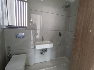 Bathroom in 1 BHK Apartment at Transcon Triumph Tower, Andheri West – for Rent