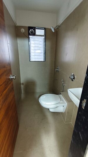 Bathroom in 3 BHK Apartment at Je and Vee Madhuban, Malad East – for Rent