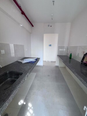 Kitchen in 3 BHK Apartment at Piramal Vaikunth, Balkum Pada – for Rent