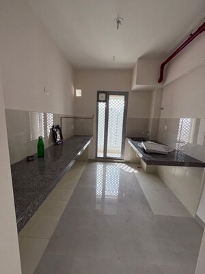 Kitchen in 3 BHK Apartment at Piramal Vaikunth, Balkum Pada – for Rent