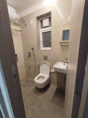 Bathroom in 2 BHK Apartment at Pratham 5TH Element, Andheri West – for Rent