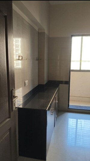 Kitchen in 1 BHK Apartment at K Raheja Heights, Malad East – for Rent