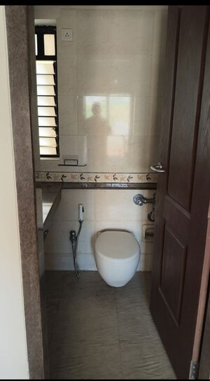 Bathroom in 1 BHK Apartment at K Raheja Heights, Malad East – for Rent