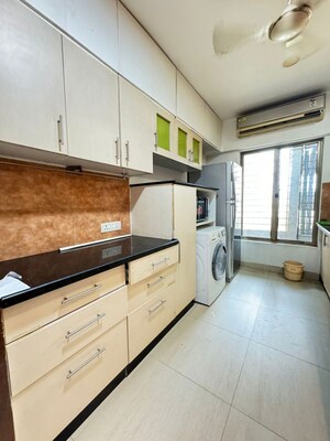 Kitchen in 2.5 BHK Apartment at Oberoi Realty Woods, Goregaon East – for Rent